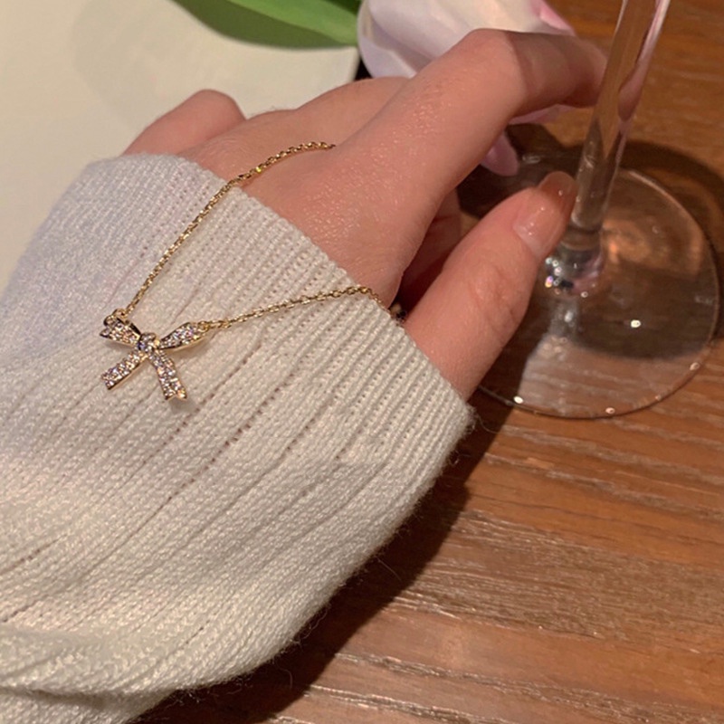 Dây Chuyền Mặt Nơ Ánh Sáng Thời Trang 2022 Sang Trọng Cho Nữ