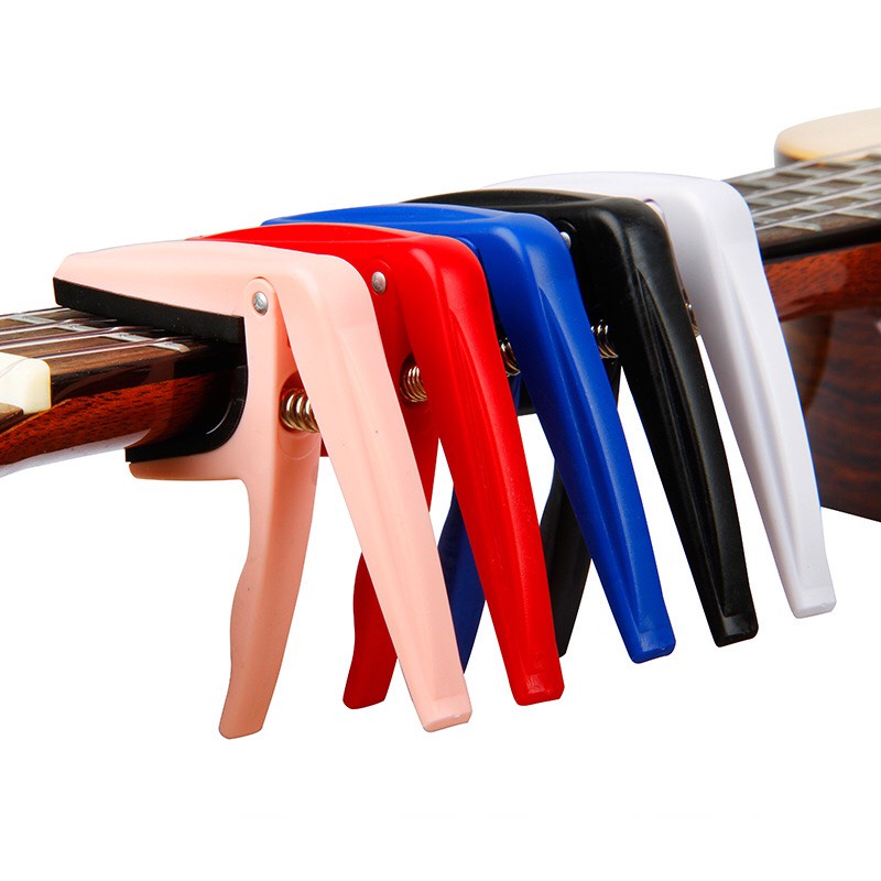 Combo Capo đàn Ukulele và 1 bộ 6 dây đàn,1 pick gảy cùng màu -Bộ 3 phụ kiện Ukulele: Capo + Bộ dây + Phím gảy