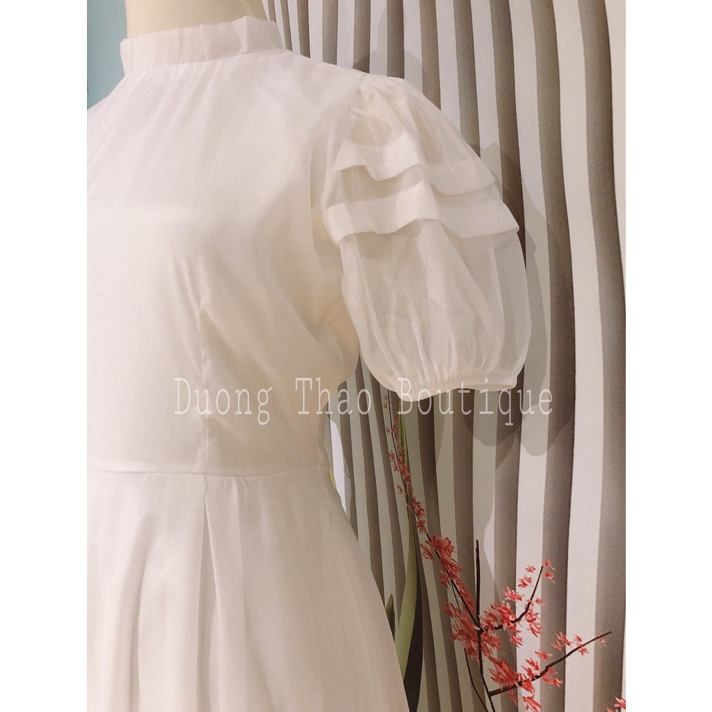Đầm dự tiệc trắng dáng xòe tay nhún xếp kiểu chất liệu tằm ánh kim