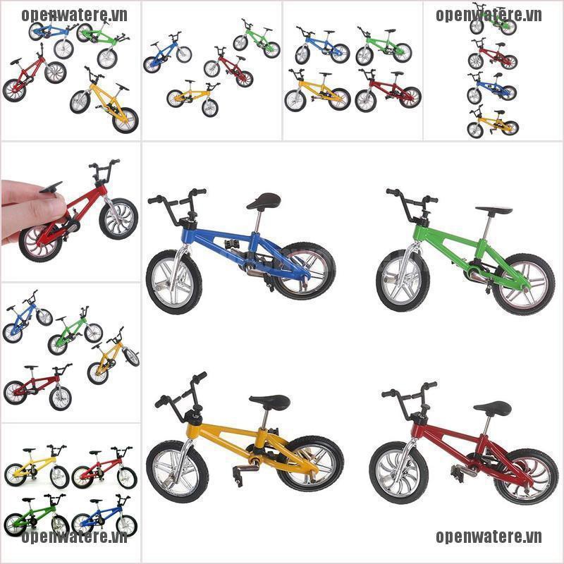 OPENE 1Pc 1:12 Dollhouse Miniature Bicycles Plastic Mini Bike Dollhouse Accessories VN