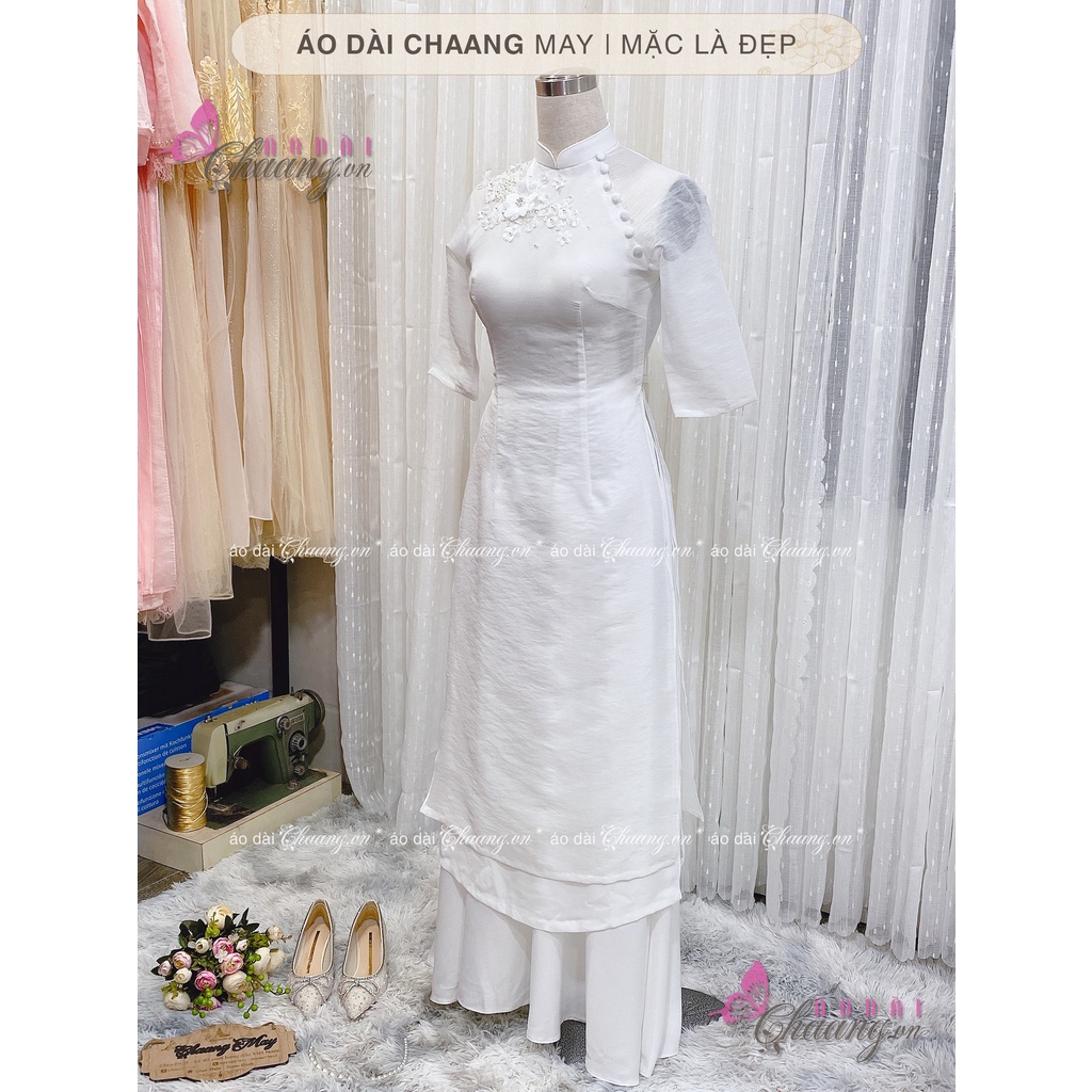 Áo Dài Trắng Cách Tân Nữ 4 Tà lệch Lụa Xước Đông Nhi Trắng Đính Ren Cúc Đẹp