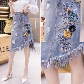 Váy denim cạp cao thêu hoa midi tua rua bất đối xứng phong cách Hàn Quốc cho nữ