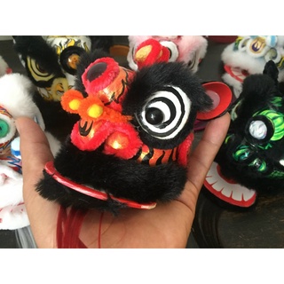Đầu lân mô hình, màu đỏ đen, vẽ tay, size 9cm.