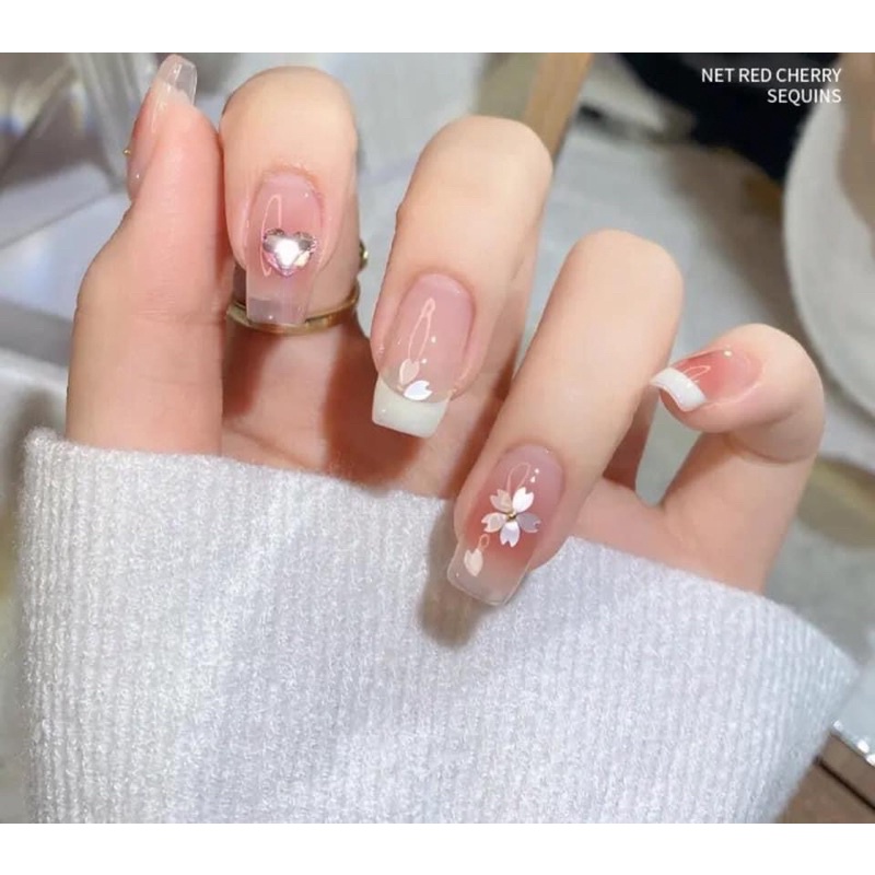 Hũ charm cánh hoa anh đào mix bi vàng trang trí móng