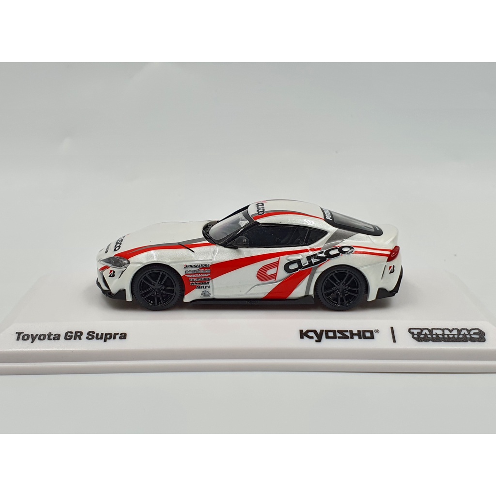 Xe Mô Hình Toyota GR Supra CUSCO 1:64 Tarmac Works/Kyosho (Trắng)