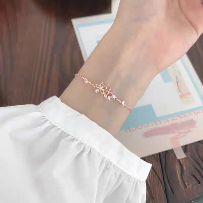 Lắc tay hoa trắng 2 màu