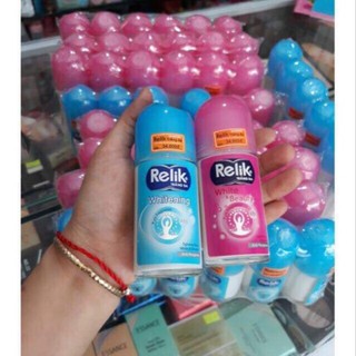 Lăn khử mùi Relik chai lớn 50ml  có 2 màu hồng và xanh như hình