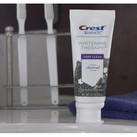 Kem đánh răng làm sạch sâu với than hoạt tính Crest 3D White Whitening Therapy 99g