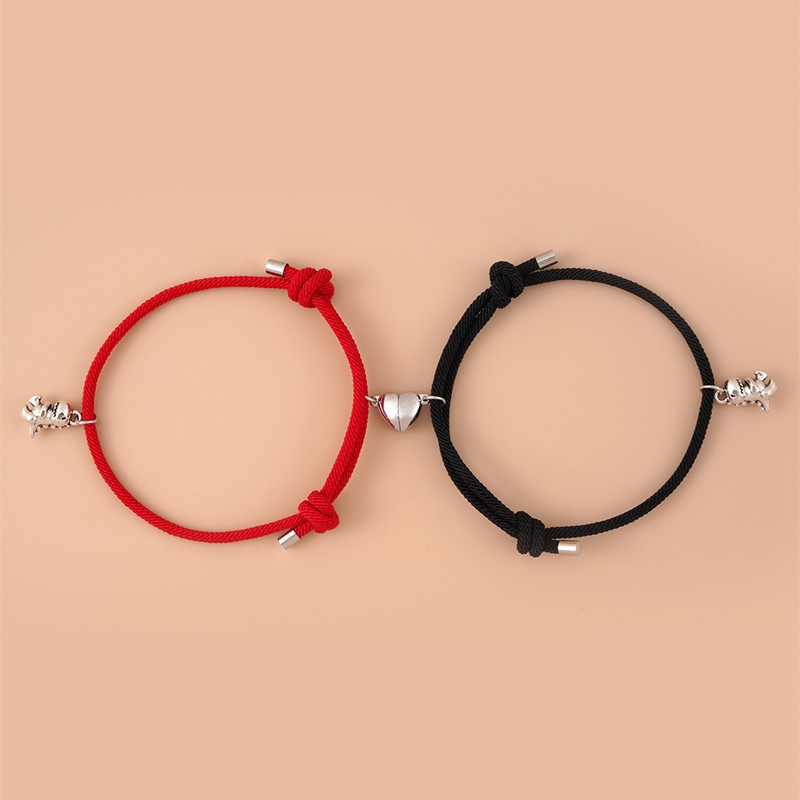 Set 2 vòng tay mặt khủng long nhỏ trái tim nam châm xinh xắn cho cặp đôi