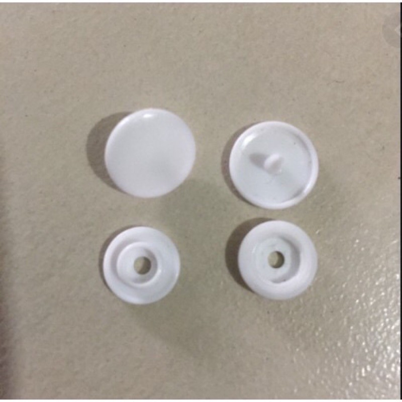 Nút trắng T3 4 chi tiết 50k/100 bộ