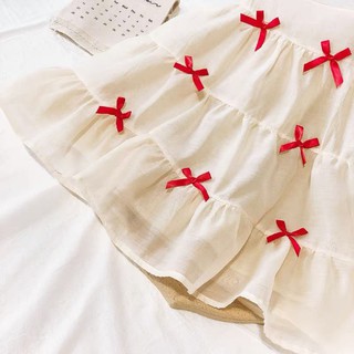 Váy 2 dây đính nơ đỏ siêu xinh