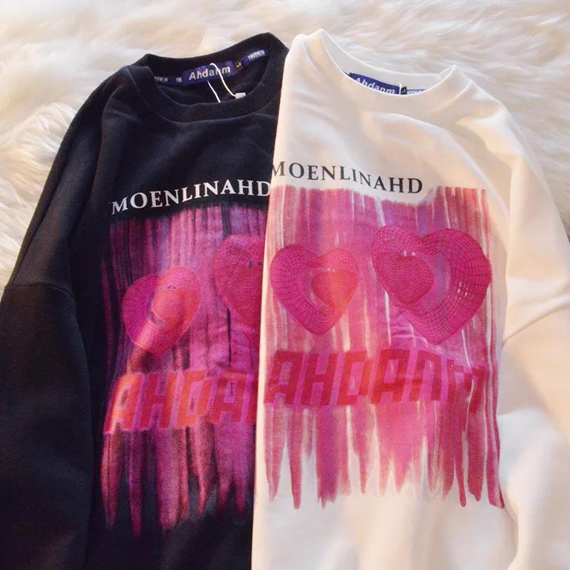 Áo thun tay dài cổ tròn in họa tiết trái tim thời trang dành cho nữ | BigBuy360 - bigbuy360.vn