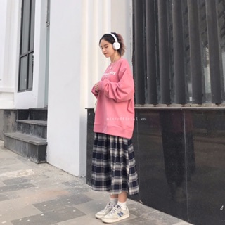 Chân váy kẻ xanh caro