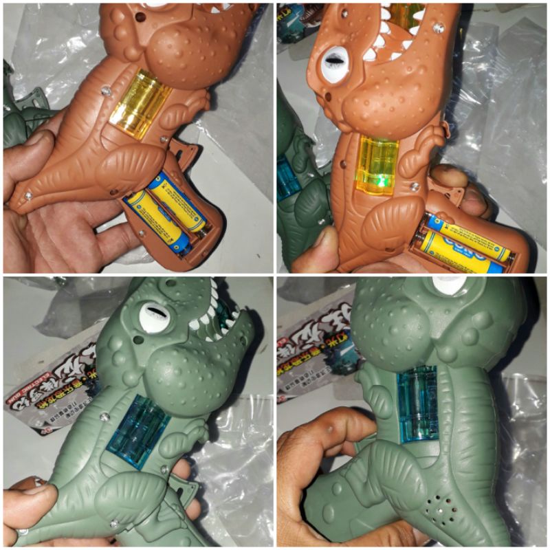 Một cái mô hình khủng long dài 18cm bằng nhựa có nhạc và đèn led rất đẹp tặng kèm pin