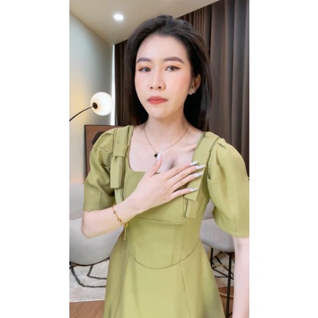 Đầm xanh nơ vai