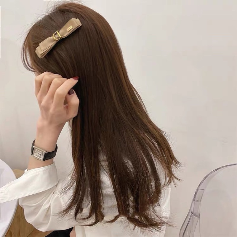 Cột-kẹp tóc nơ CD