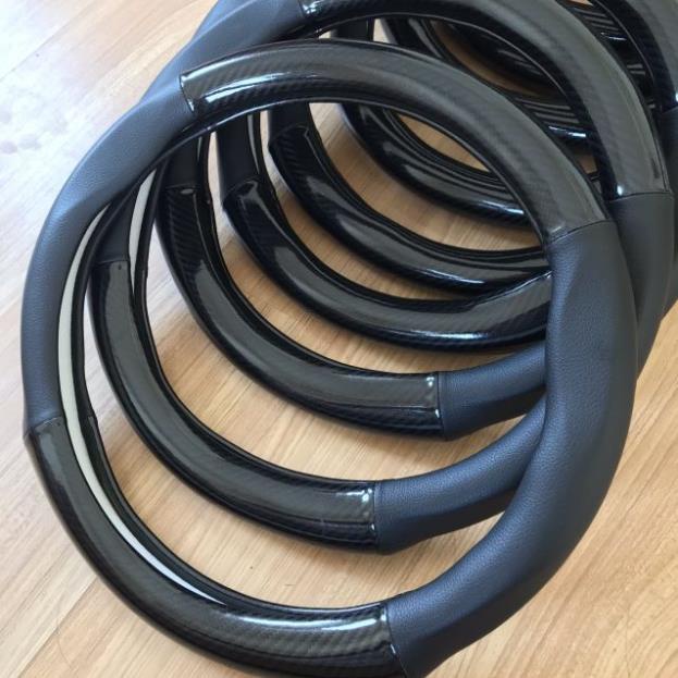 Bọc Vô Lăng Mitsubishi xpander outlander pajero sport triton attrage jolie chất liệu da vân cacbon size 38cm