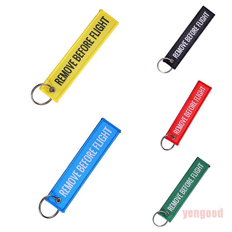 Móc khóa thêu chữ REMOVE BEFORE FLIGHT nhiều màu tùy chọn