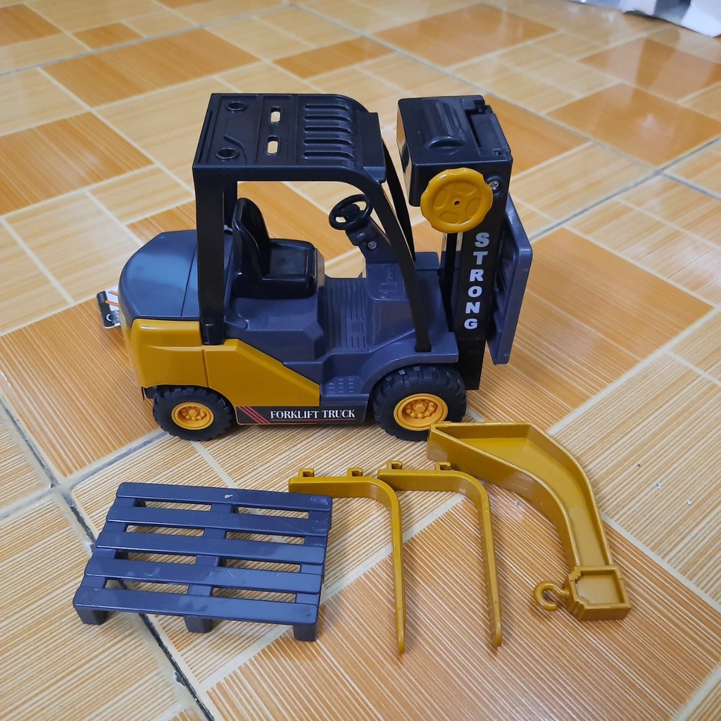 Xe nâng đồ chơi trẻ em bằng nhựa chạy đẩy trớn bằng bánh đà có giá nâng lên được