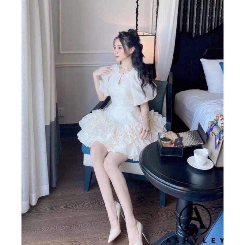 Đầm gấm xoè xếm tầng