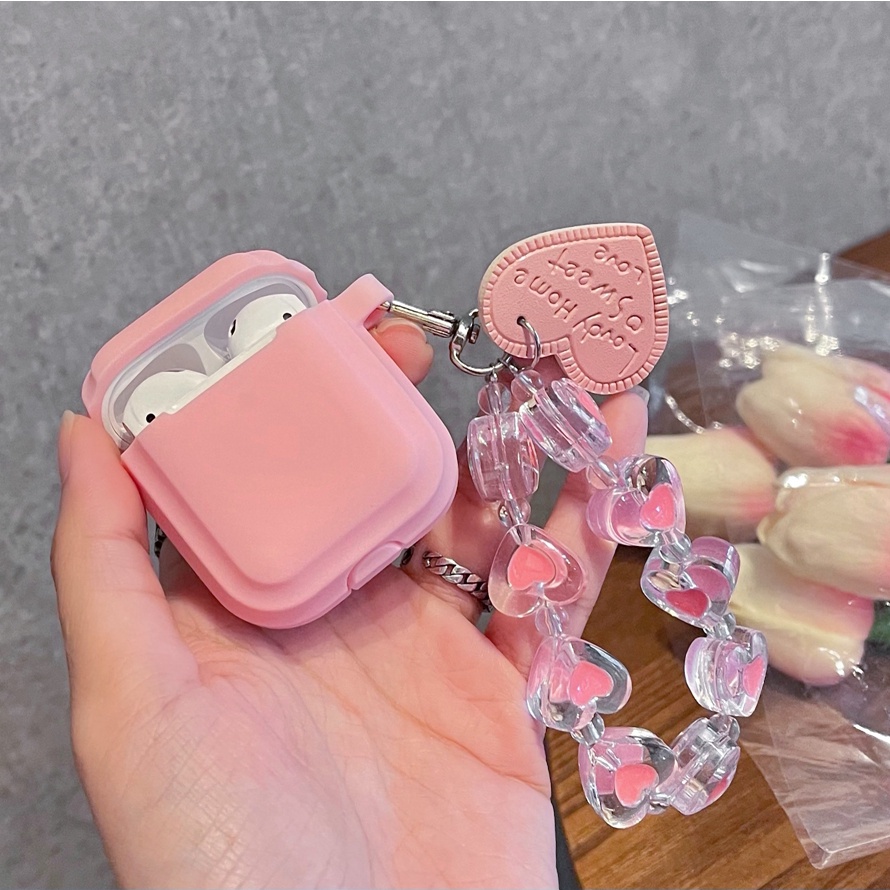 Vỏ bọc TPU mềm bảo vệ hộp sạc tai nghe airpods 1/2 pro bluetooth màu hồng phối dây đeo dễ thương