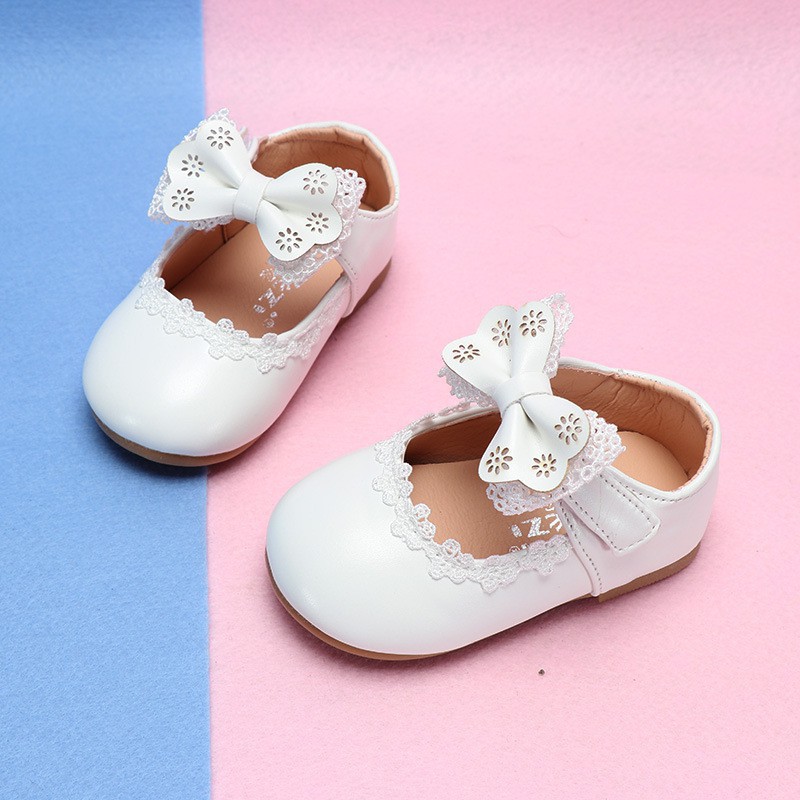 Giày sandal bằng da PU êm chân với trang trí nơ xinh xắn cho bé gái