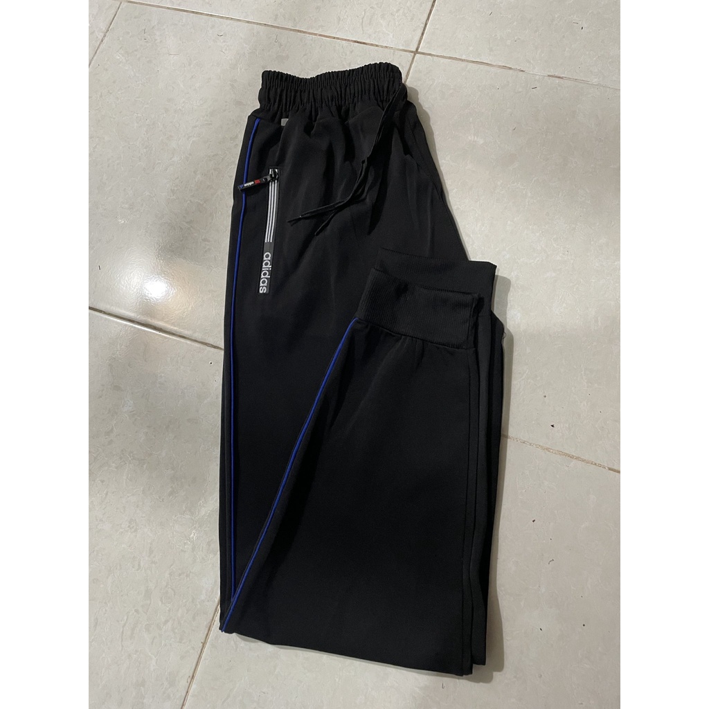 Quần thể thao Nam_Nữ có khóa kéo phối sọc UNISEX. Trẻ Trung Năng Động