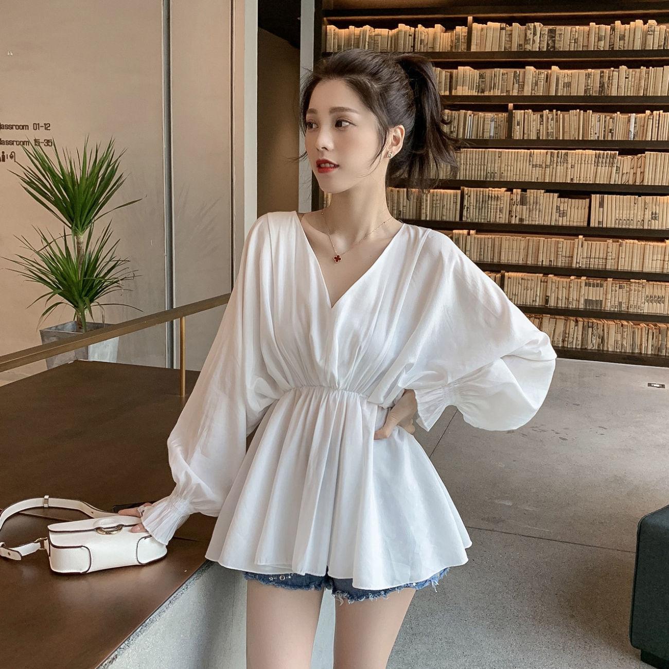 Women's top 2021 new Korean loose white shirt women's design sense niche top medium length T-shirt fashion