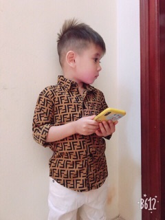 Áo sơ mi da rắn cho bé