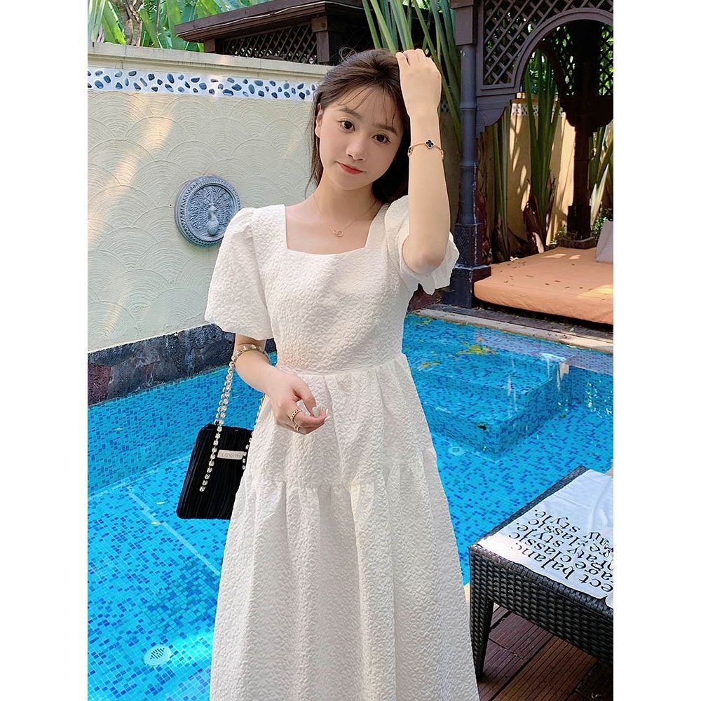 Đầm hở lưng tay phồng pháp mới dài trung bình tính khí Váy trắng cổ vuông eo cao nữ