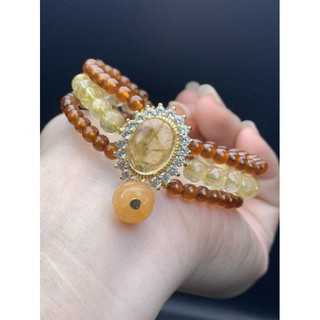 vòng tay mặt tóc vàng