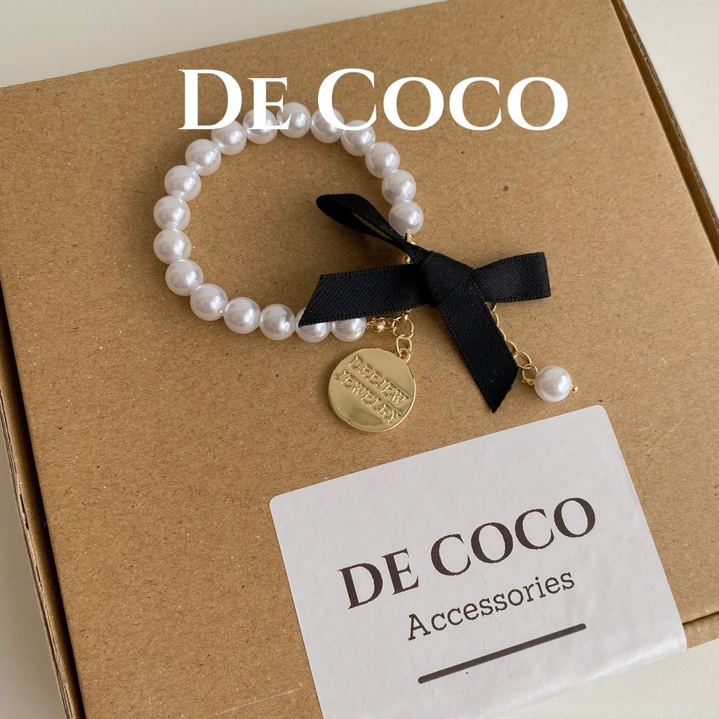 Vòng tay lắc tay nơ đen hạt trai Carla De Coco decoco.accessories