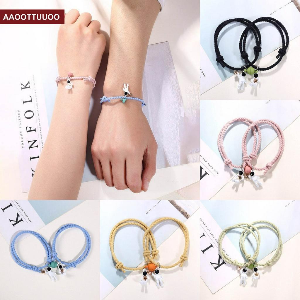 Set 2 Vòng Tay Cao Su Mặt Hình Phi Hành Gia Cho Cặp Đôi