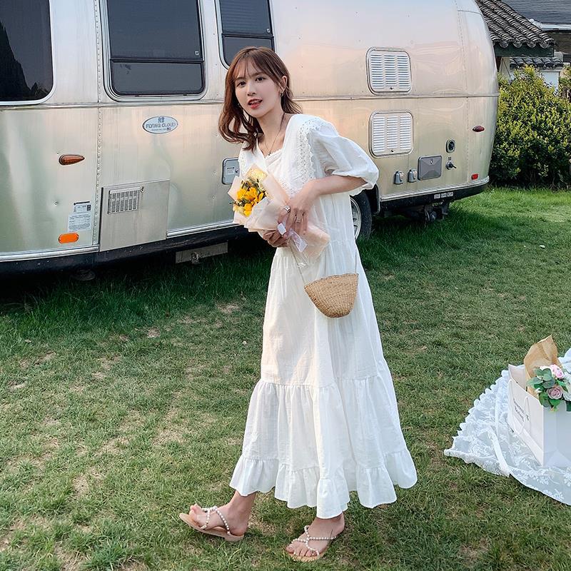 Đầm dáng rộng màu trắng dài hơn đầu gối thời trang cho nữ