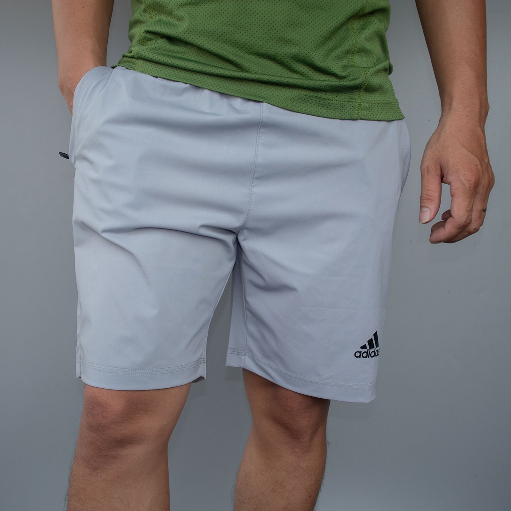 Quần short đùi thể thao nam chất gió co giãn 4 chiều không thấm nước Das 3 sọc bên sườn