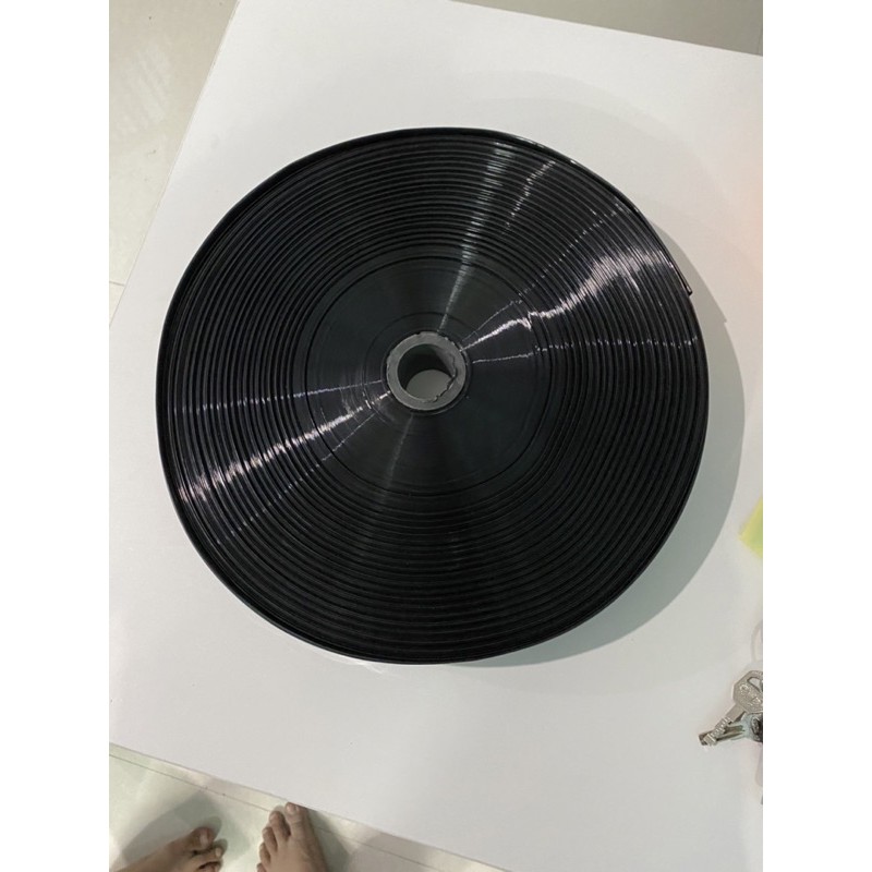 Dây tưới phun mưa phi 34mm loại 5 lỗ chéo cuộn 100m