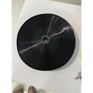 Dây tưới phun mưa phi 34mm loại 5 lỗ chéo cuộn 100m