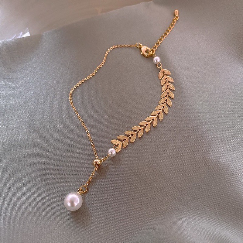 vòng tay lá vàng freesize phối hạt giả ngọc mã HK-61