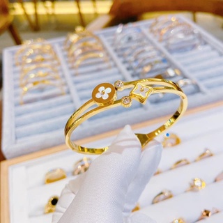 Vòng titan Lv mạ vàng ko đen