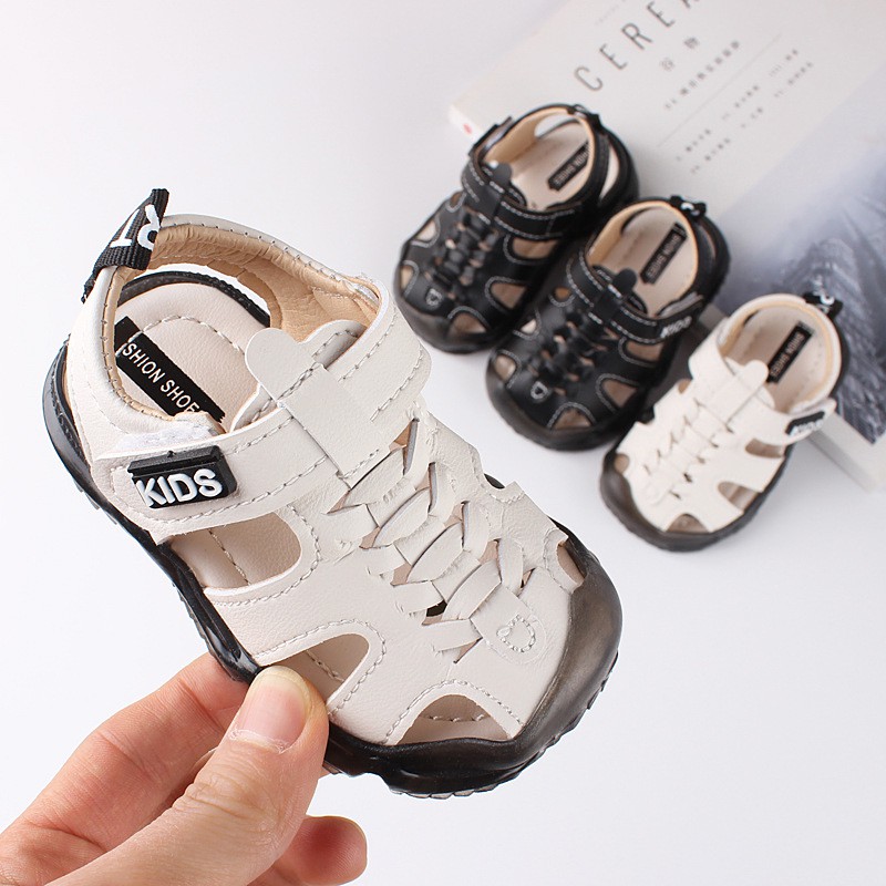 Sandal tập đi cho bé, Dép rọ bé trai bé gái quai dán KIDS chất da PU thoáng khí có chống vấp cho bé từ 0-2 tuổi M8810