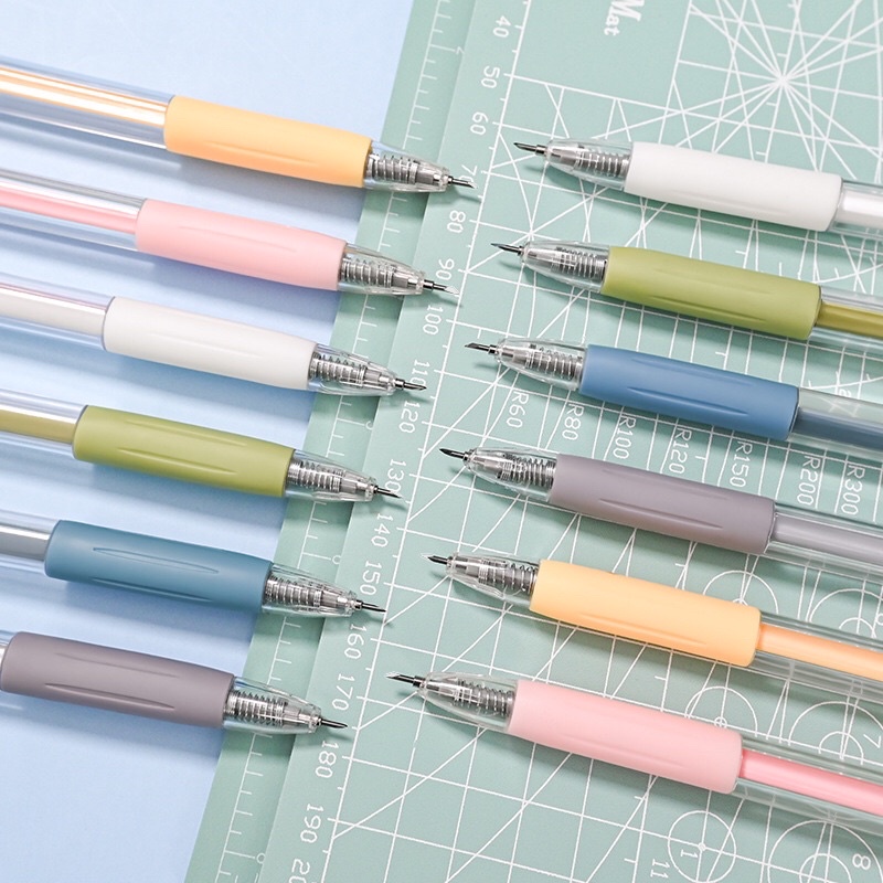 Dao rọc giấy dạng bút bi bấm tone màu pastel có đệm lót silicon, lưỡi dao 30 độ sắc bén