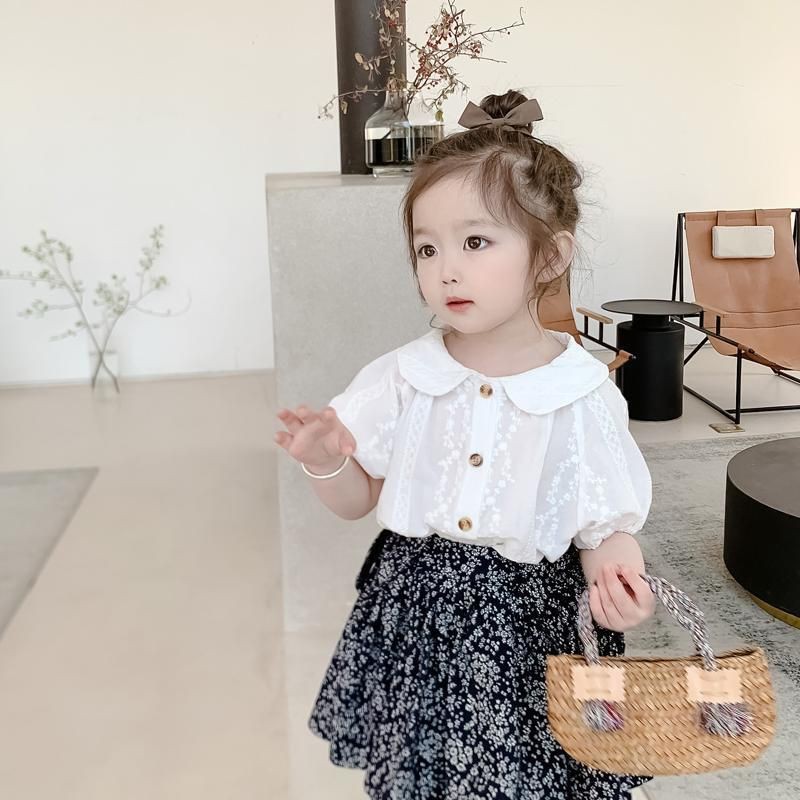 set váy yếm hoa và sơ mi trắng cho bé hàng quảng châu