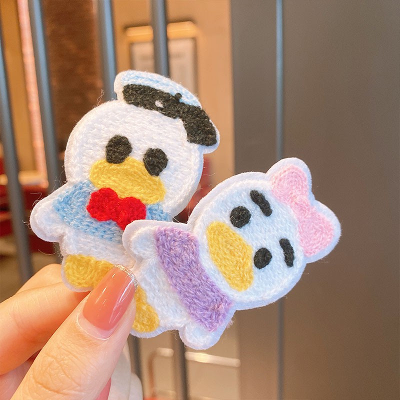 Kẹp tóc hình hoạt họa dành cho bé gái