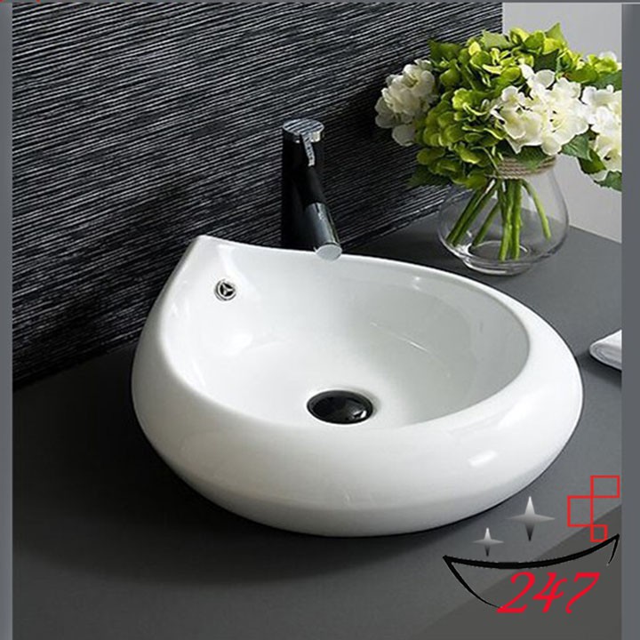 Chậu rửa lavabo hình cánh hoa với thiết kế nhỏ gọn độc đáo phù hợp với nhiều không gian .