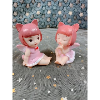 Em bé thiên thần xám hồng