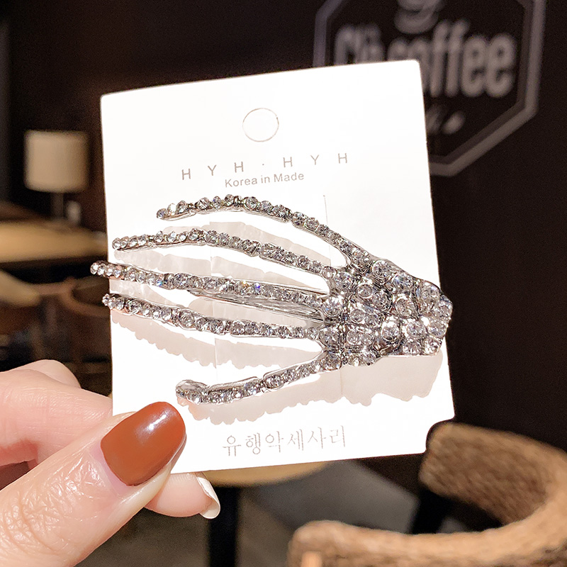 Kẹp tóc hình bàn tay đính đá kim cương