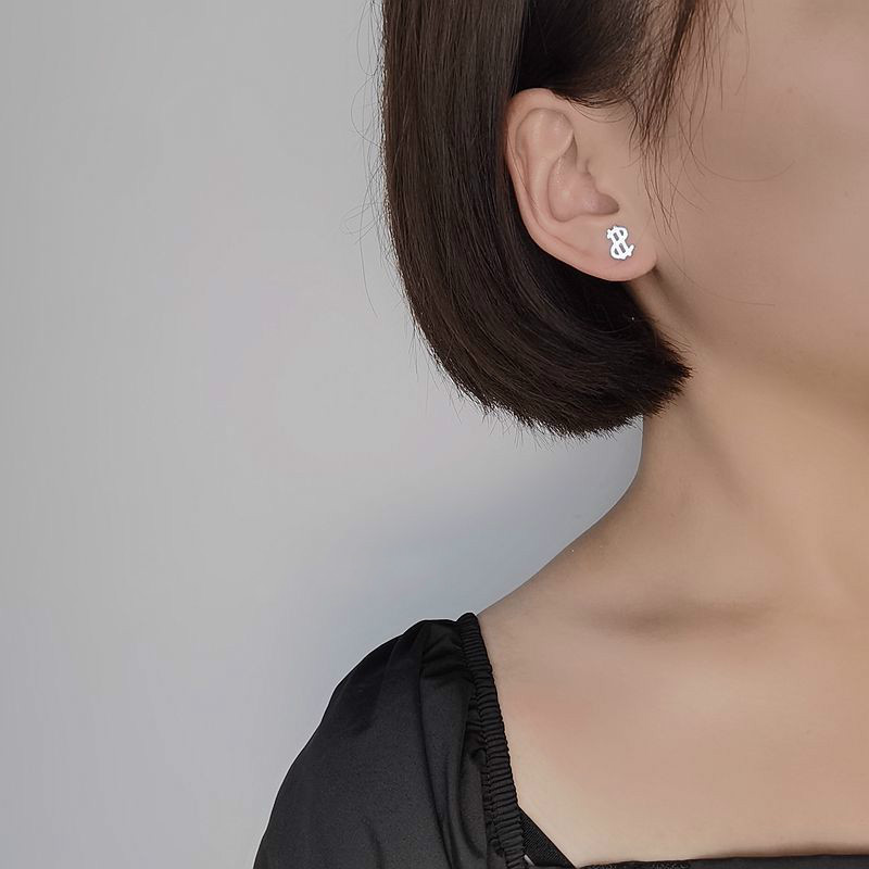 Hoa tai thiết kế hình ký hiệu dollar cá tính thời trang