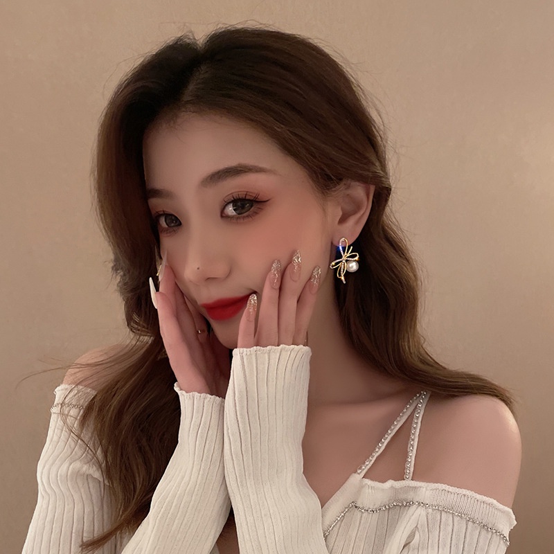 Khuyên tai nữ ngọc trai nhân tạo hình chiếc nơ kiểu dáng dễ thương bông tai Hàn Quốc chất liệu cao cấp không phai màu