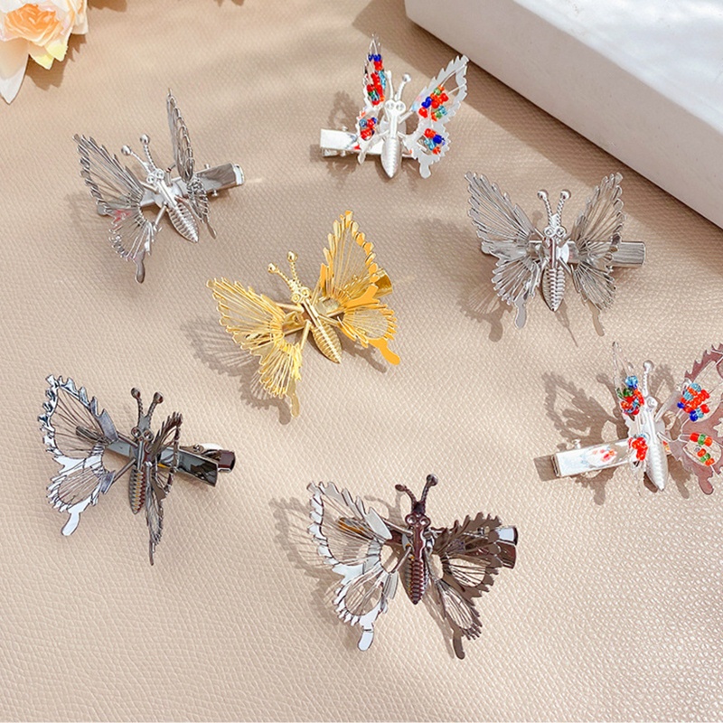 Kẹp Tóc Tua Rua Hình Cánh Bướm Đính Ngọc Trai Cho Nữ