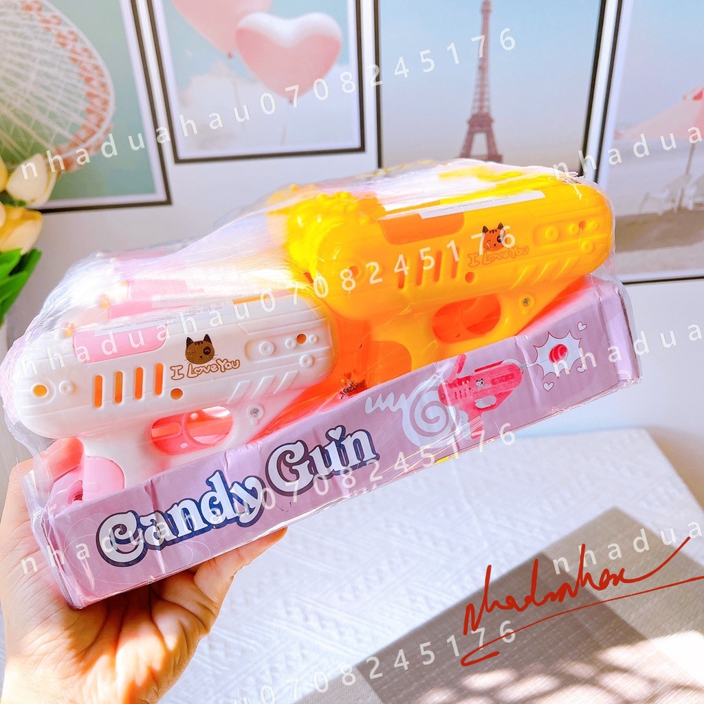 Sỉ - Lốc 12 cái máy s.úng bắn kẹo mút (có kẹo) Hongkong CandyGun cute cho bé